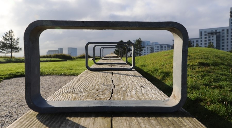 Abstract diminishing perspective view through loops on public bench. A metaphor for relationships.